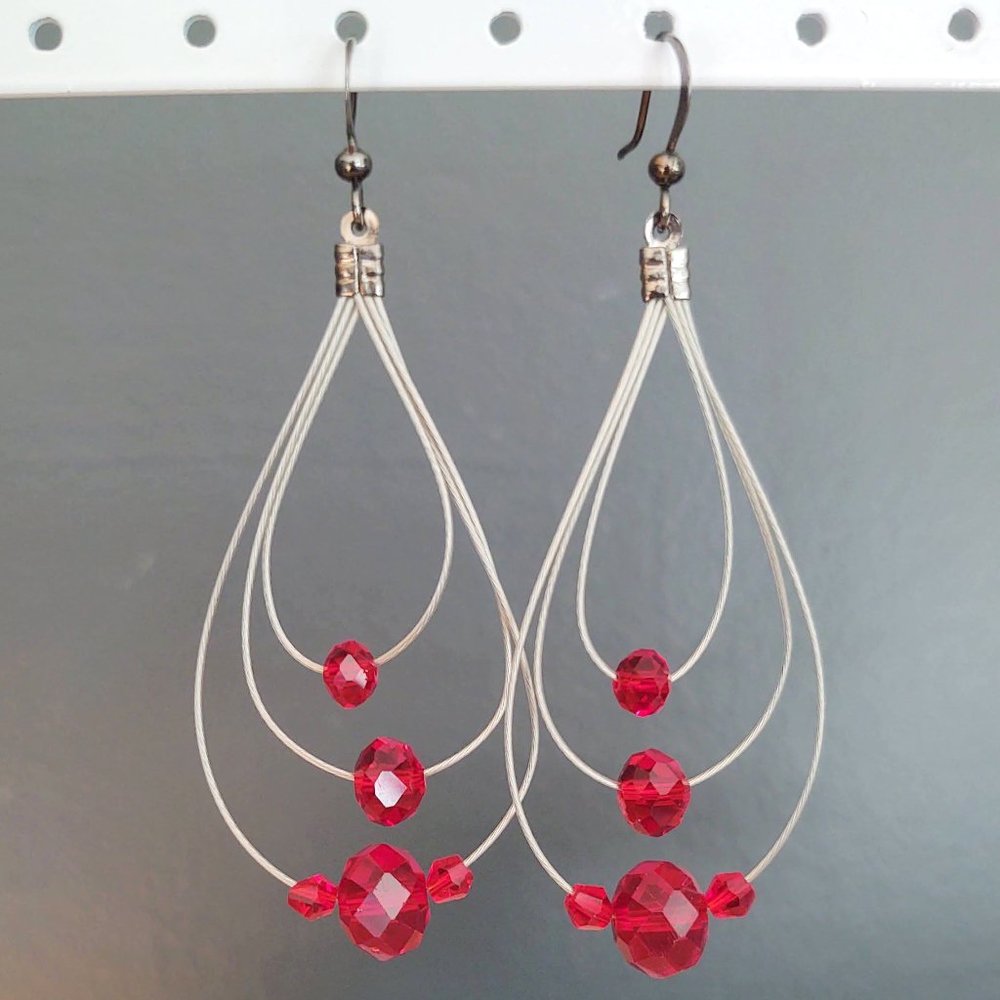Wire earrings with red beads